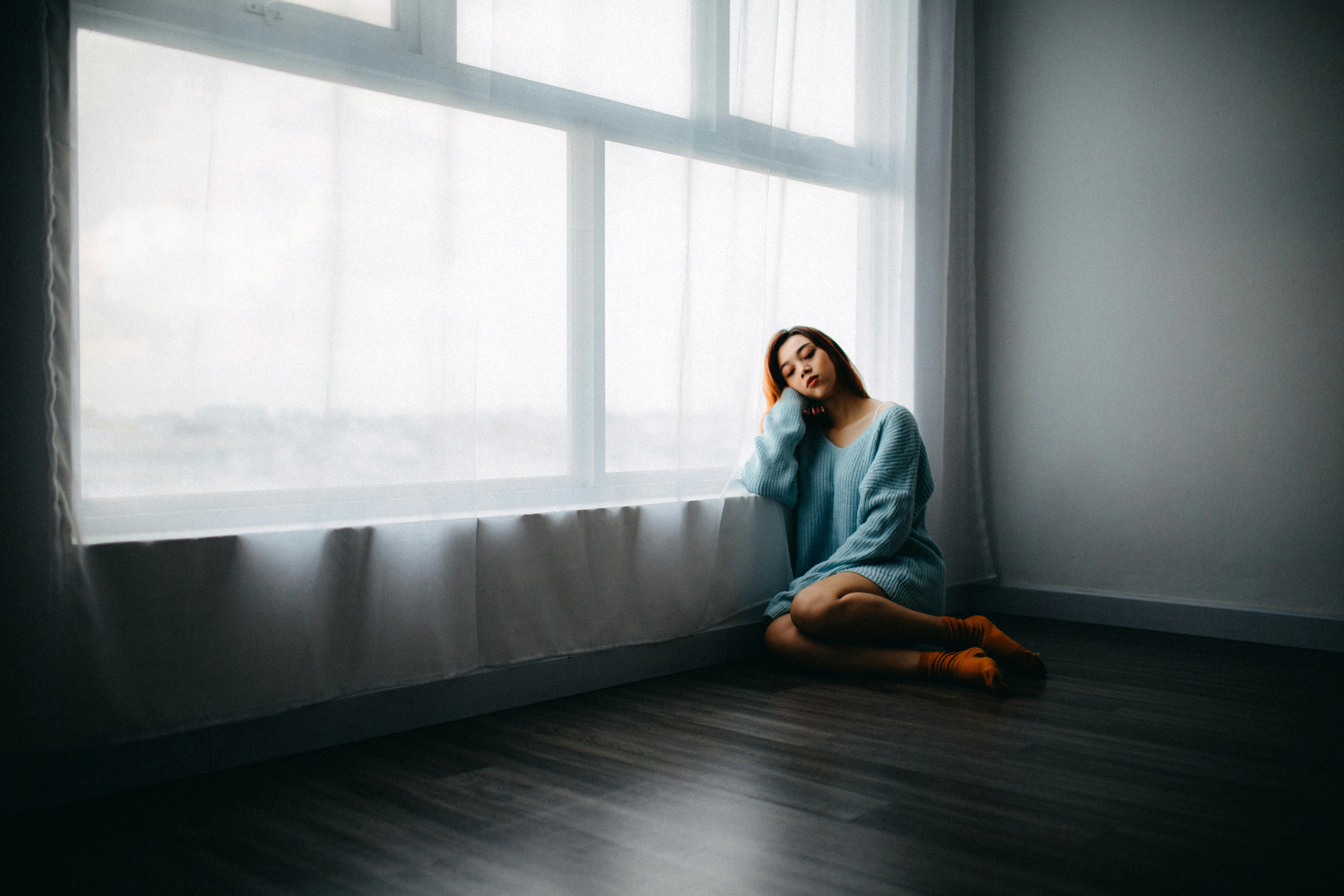 a sad and withdrawn woman