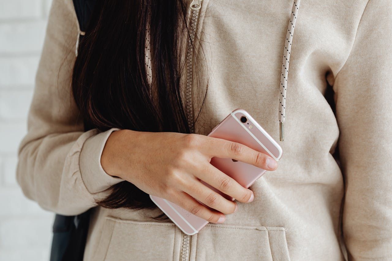 a woman ignoring a text