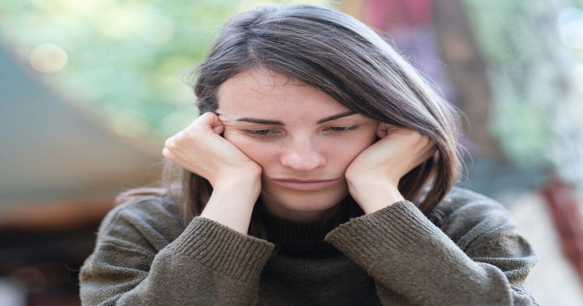 a woman lost in thoughts