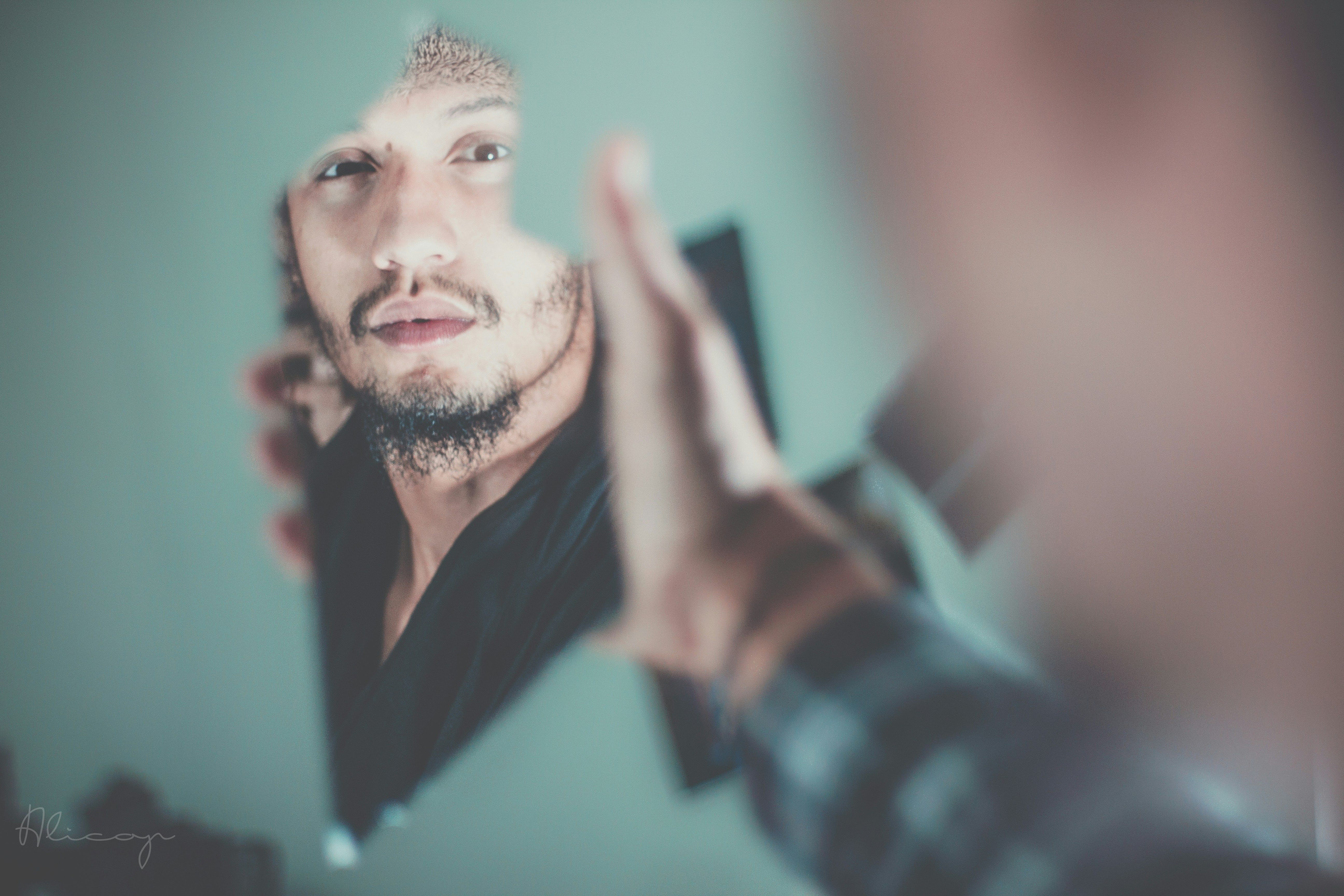 Person looking at their reflection