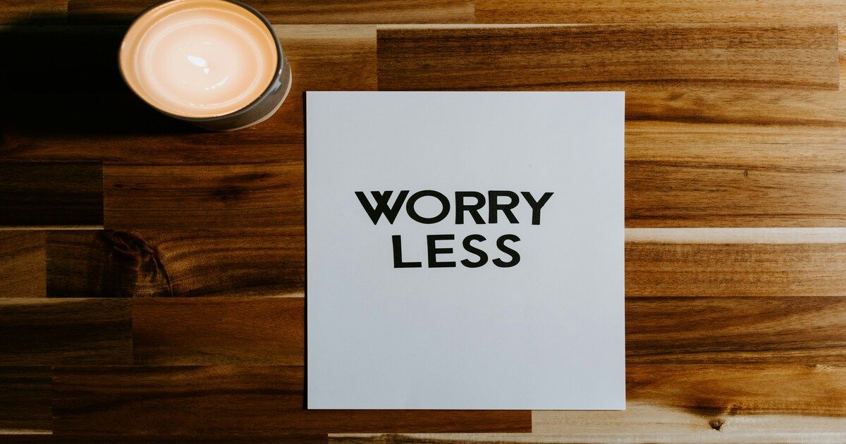 an image with the text 'worry less'